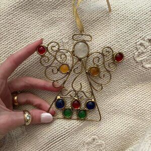 Gold tone metal and colorful gem stone angel
